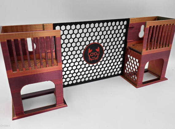 Hermit crab dual climbing tower and climbing wall with upper and lower hide areas